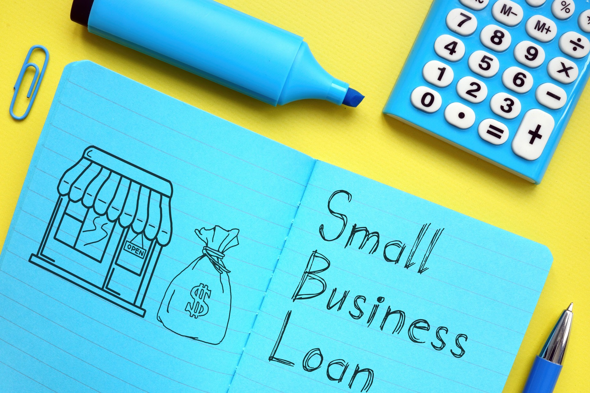 Small business loan is shown on the business photo using the text